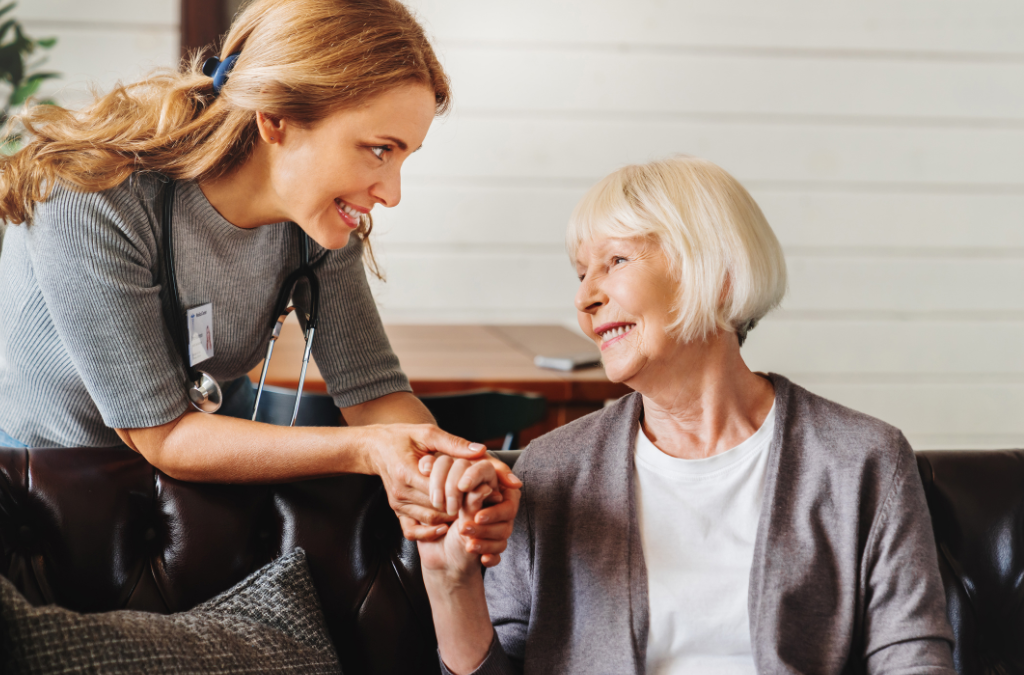 a caregiver with her patient who is suffering from dementia as a result of Alzheimer's disease